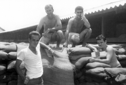 15. Da Nang AB: Off duty 35th APS airmen hang around sandbag bunker they might take shelter in during a mortar attack. Photo: Left/front: Charles Mcilwain; Right/Front: James McNall; Top/left: Charles Schidknecht (deceased); Top/right: Joe Campo.