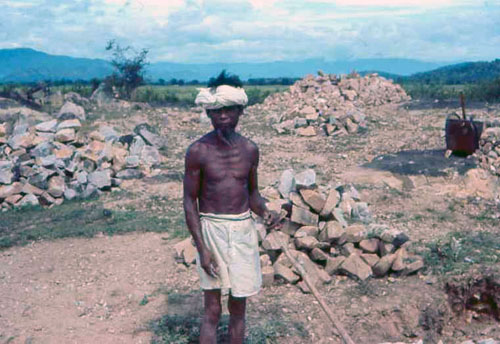 10. Phan Rang Area. Breaking up Rocks Photo by: SSgt John Achelpohl. 1966.