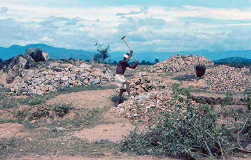 9. Phan Rang Area. Breaking up Rocks Photo by: SSgt John Achelpohl. 1966.