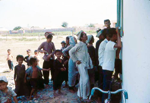 15. Phan Rang MED Call. Window peepers. Photo by: SSgt John Achelpohl. 1966.