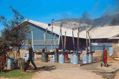 5. Phan Rang Dining Hall Mess-Kit washing area. Photo by: SSgt John Achelpohl. 1966.