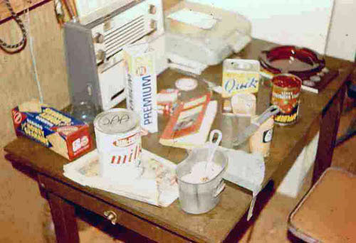 17. Phan Rang SPS Quarters: Dining-In Photo by: SSgt John Achelpohl. 1966. Note: Canteen Cup, Chocolate mix, crackers and peanut butter and a radio -- gotta love it! 