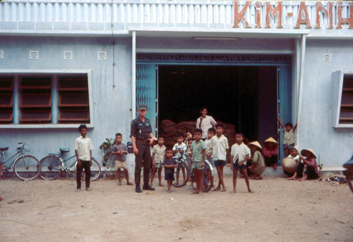 22. Phan Rang Joint Town Patrol. Market Photo by: SSgt John Achelpohl. 1966.