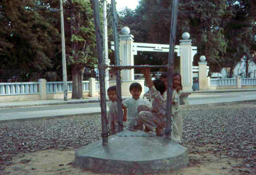 32. Phan Rang Joint Town Patrol. Children playing Photo by: SSgt John Achelpohl. 1966.