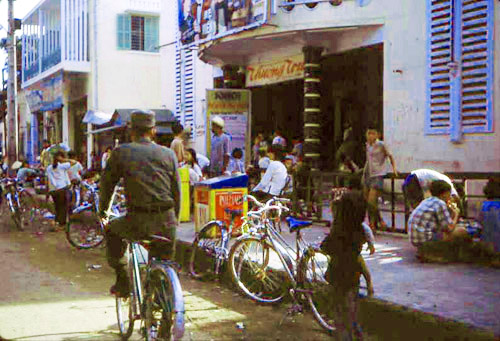 38. Phan Rang Joint Town Patrol. Market Photo by: SSgt John Achelpohl. 1966.