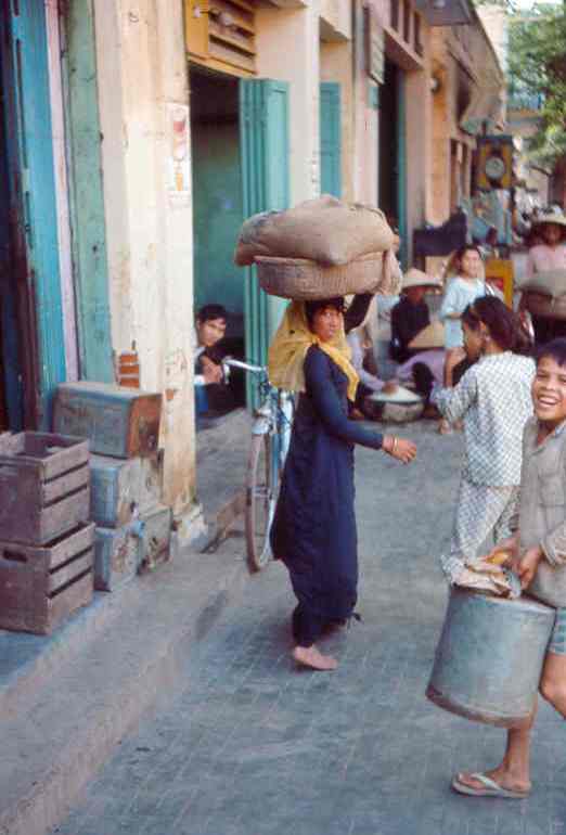 41. Phan Rang Joint Town Patrol. Market Photo by: SSgt John Achelpohl. 1966.