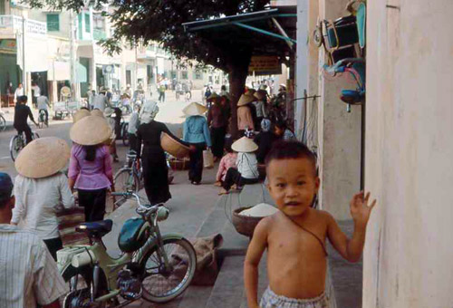 48. Phan Rang Joint Town Patrol. Market Photo by: SSgt John Achelpohl. 1966.