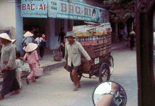 47. Phan Rang Joint Town Patrol. Market Photo by: SSgt John Achelpohl. 1966.