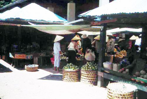 49. Phan Rang Joint Town Patrol. Market Photo by: SSgt John Achelpohl. 1966.