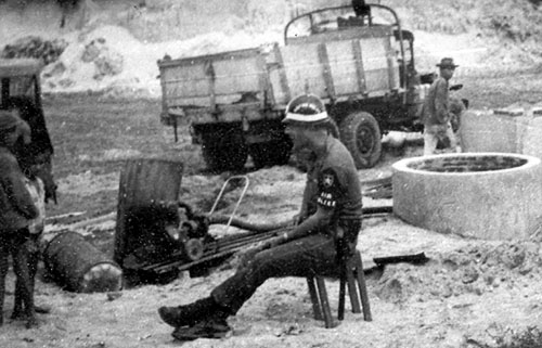 8. Phan Rang Joint Town Patrol. Getting Jeep washed. Photo by: SSgt John Achelpohl. 1966.