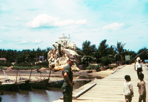 9. Phan Rang Joint Town Patrol. River bridge crossing. Photo by: SSgt John Achelpohl. 1966.